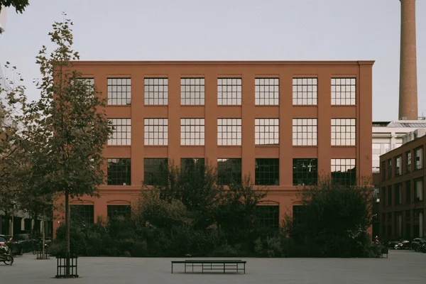 Red brick building with large windows