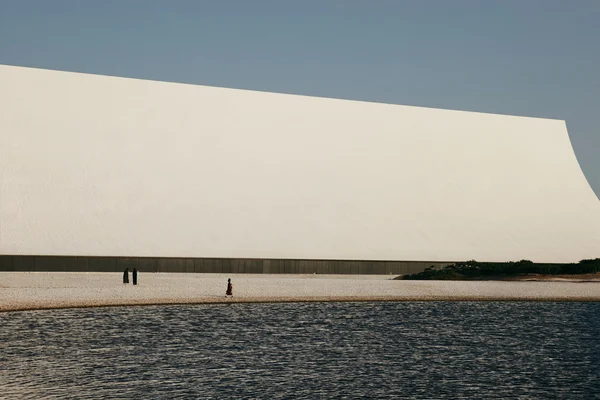 Modern white museum by the water