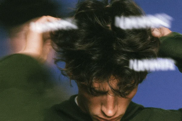 Person pulling at their hair