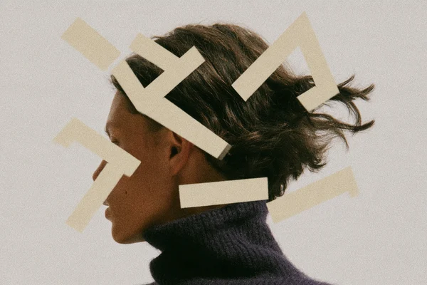 Profile portrait with abstract symbols