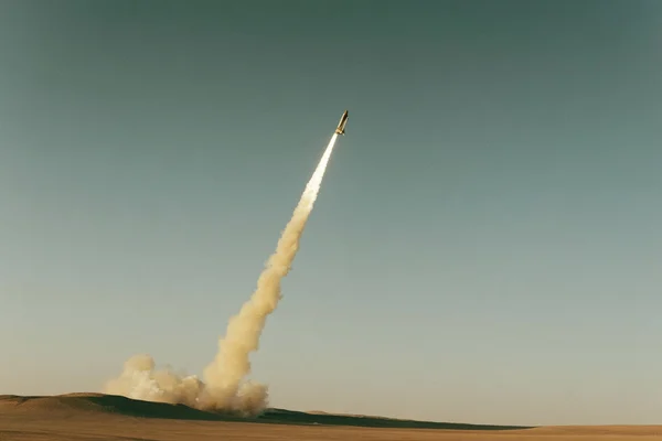 Rocket launching over a desert landscape