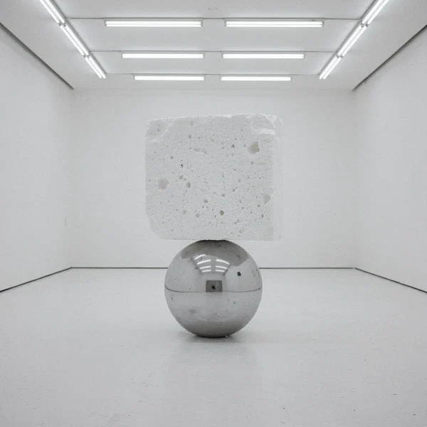 Minimalist Sculpture of Sphere and Block