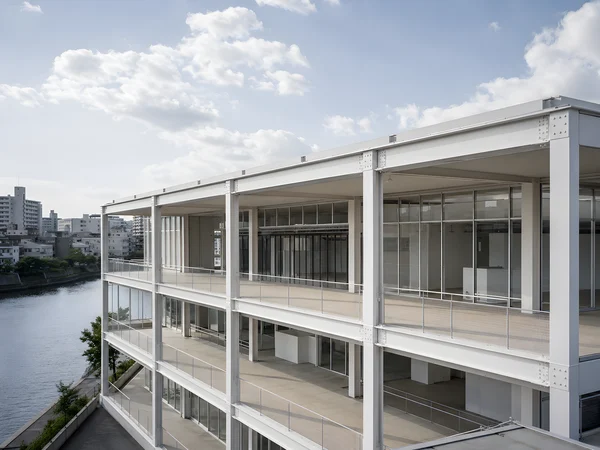 Modern White Steel Building by the River