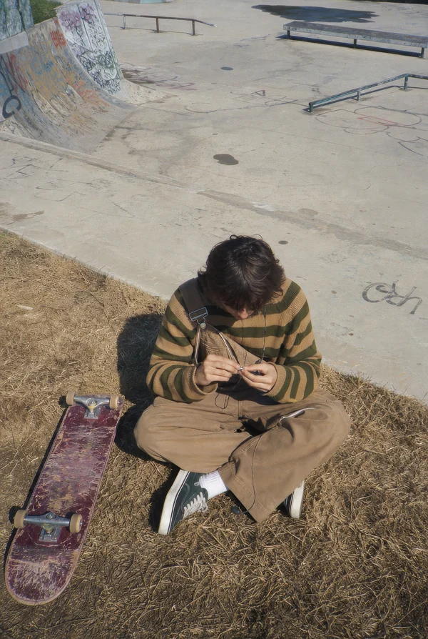 Skater Resting at the Park