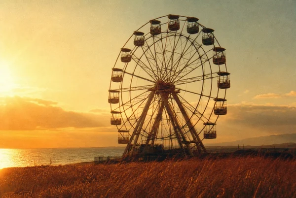 Ferris Wheel at Sunset by the Sea