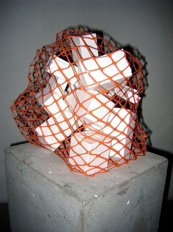 Abstract Sculpture of Cubes in Orange Netting