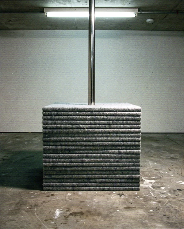Minimalist Sculpture in a Concrete Room