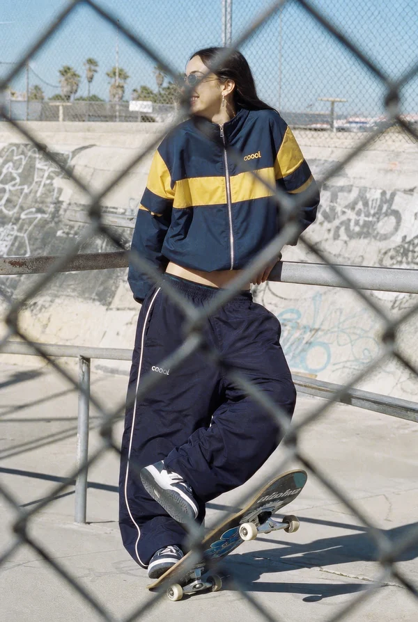 A Young Woman Posing with a Skateboard