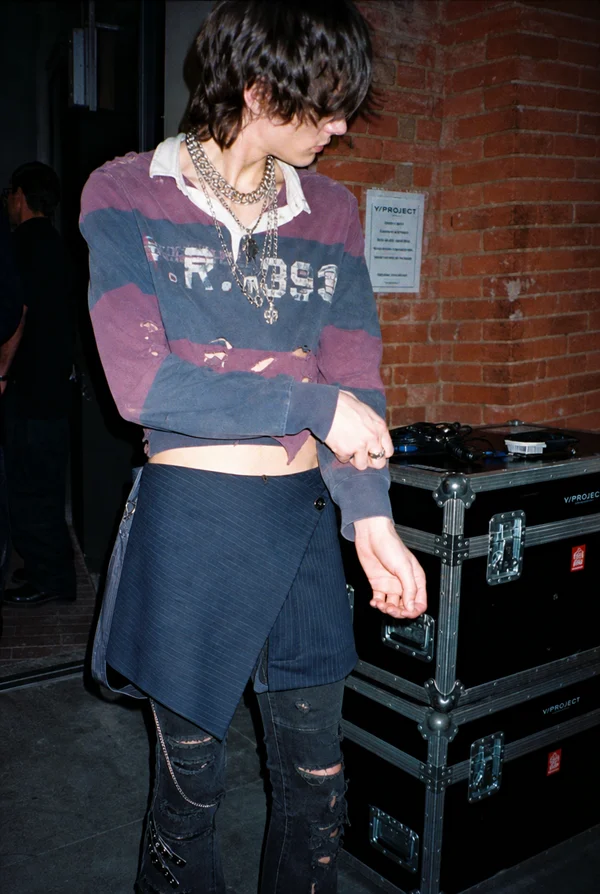 A Person Wearing Layered Streetwear Fashion