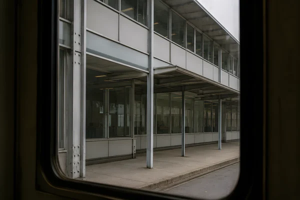 View of a Modern Office Building from a Train