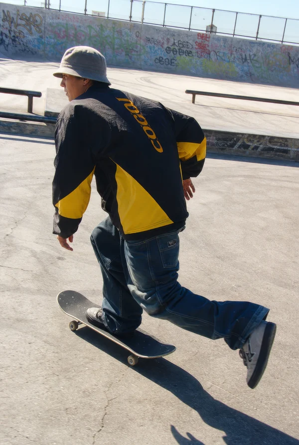 Skateboarder in a Concrete Skatepark