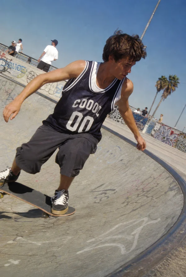 Skateboarder in a Concrete Bowl