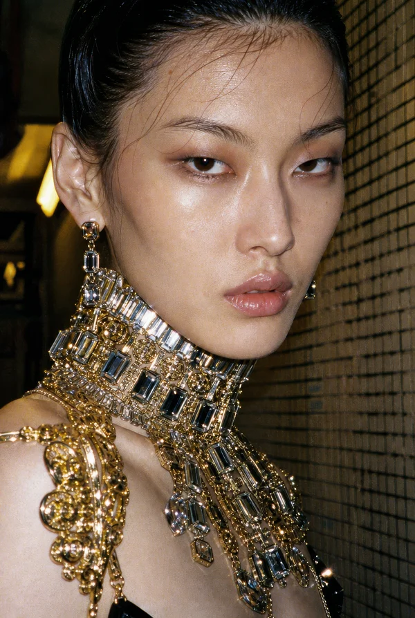 Portrait of a Woman Wearing Statement Jewelry