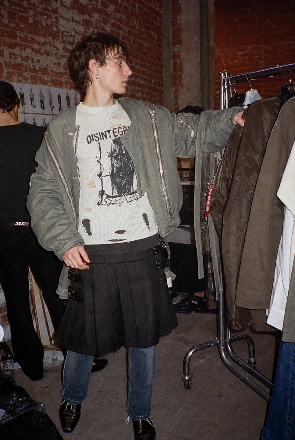 Fashion Model Backstage in Layered Streetwear