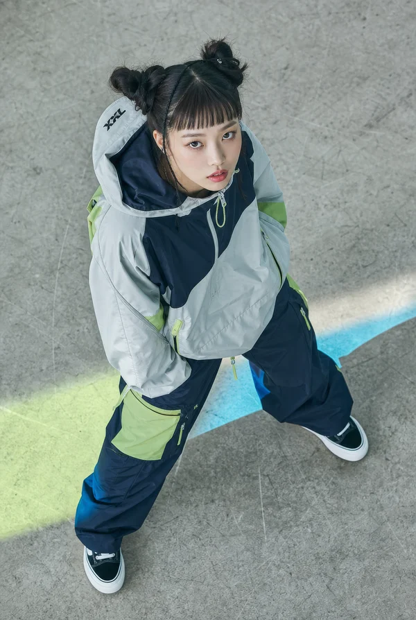Young Woman in Sportswear Looking Up