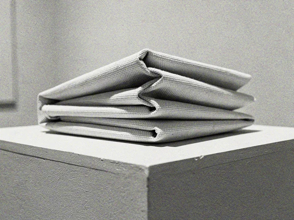 Folded Fabric Texture on a Pedestal