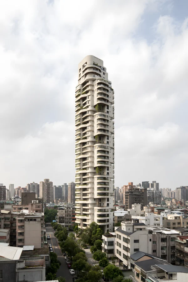 Modern Skyscraper in a Dense Urban Landscape