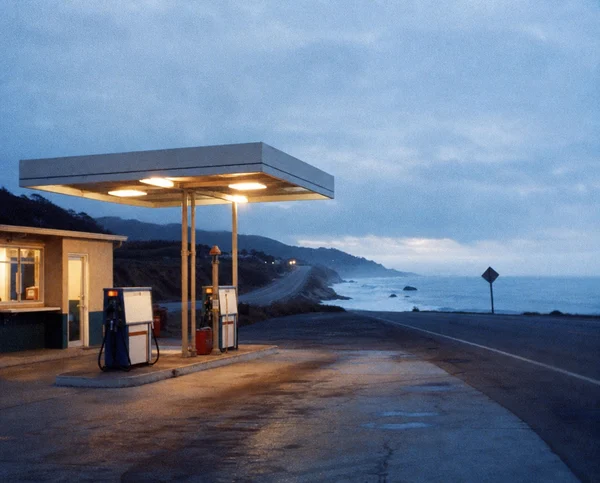 A Quiet Gas Station by the Ocean at Twilight