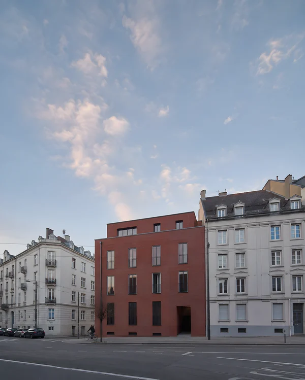 Modern Red Brick Building in Urban Street