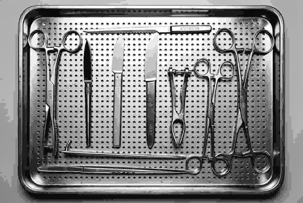 Surgical Instruments on a Metal Tray