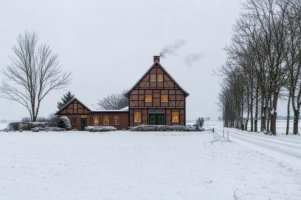 Traditional Timber Framed House in Winter