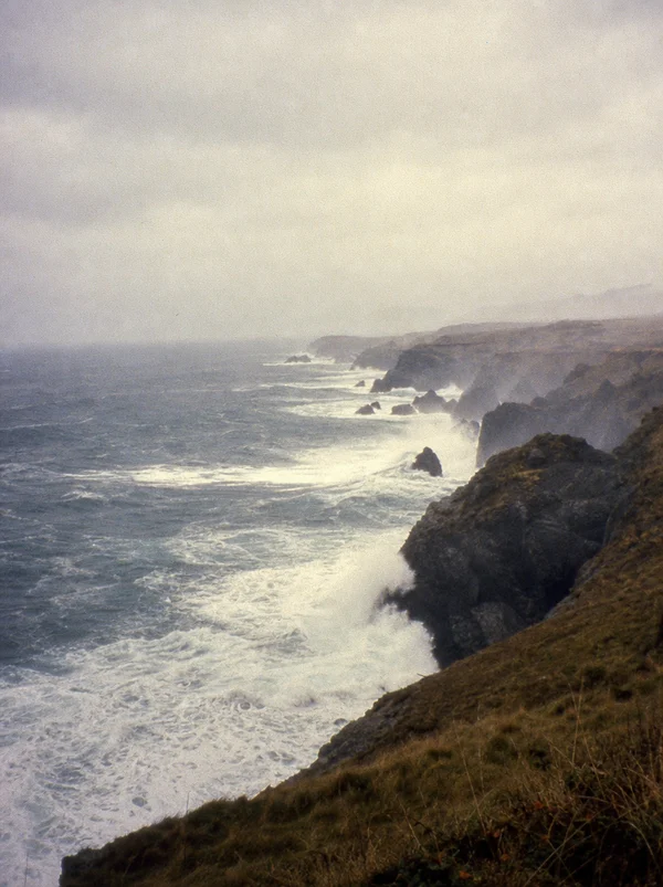 Rugged Coastal Cliffs and Crashing Waves