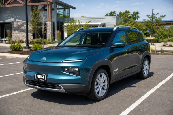 Teal Crossover SUV Parked at Community Center