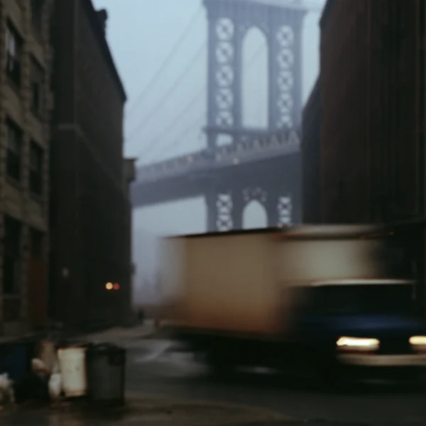City Street View with Bridge and Moving Truck