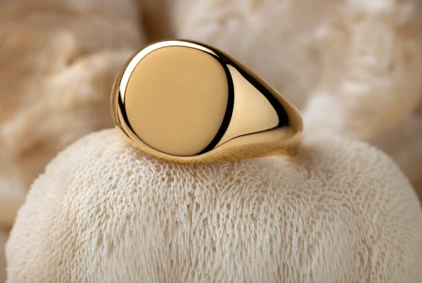 Gold Signet Ring on Textured Mushroom