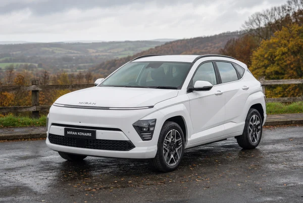 White Crossover SUV Parked on Country Road