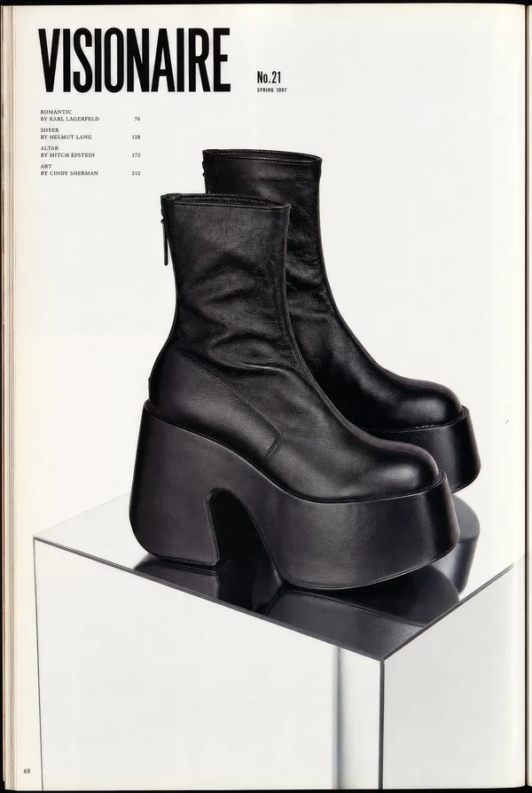 Black Leather Platform Boots on Mirrored Stand