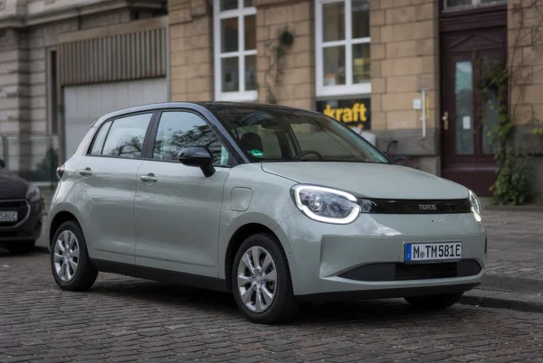 Modern Electric Hatchback Parked on City Street