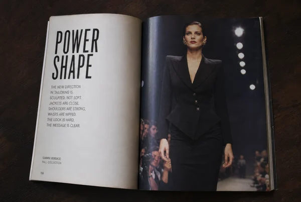 Vintage Magazine Spread Featuring Tailored Suit