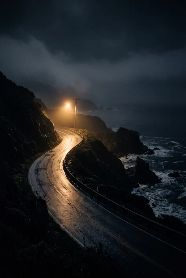 A Winding Coastal Road at Night