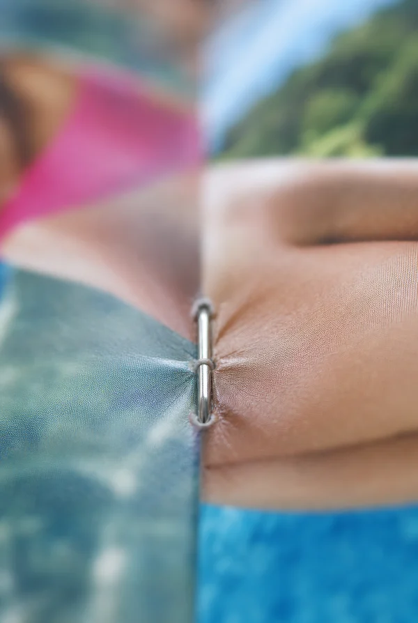Macro View of a Metal Staple in a Booklet