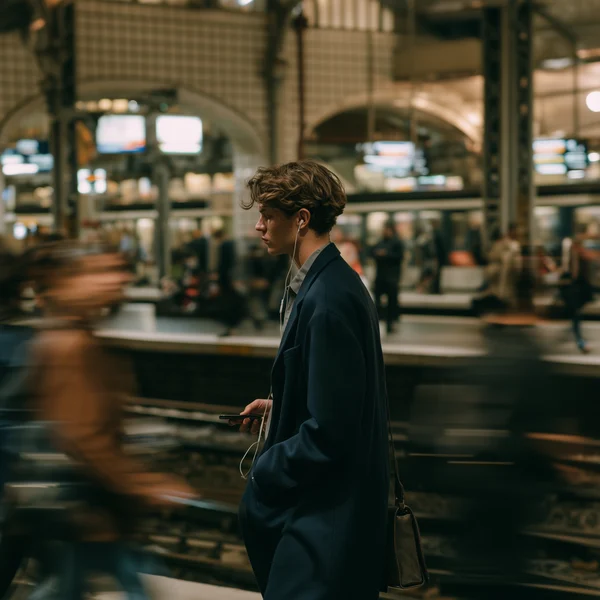 Commuter Waiting at a Busy Metro Station