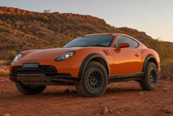 Rugged Orange Sports Coupe on Red Dirt Trail
