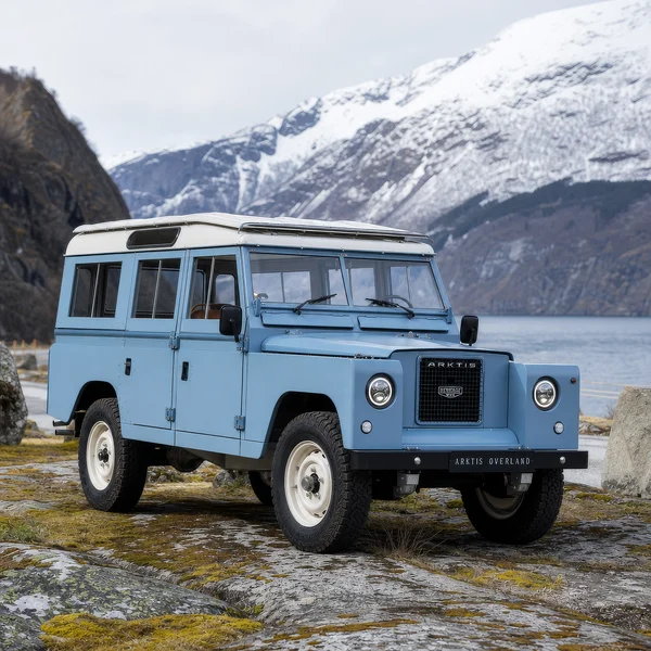 Vintage Blue Off-Road Vehicle by a Fjord
