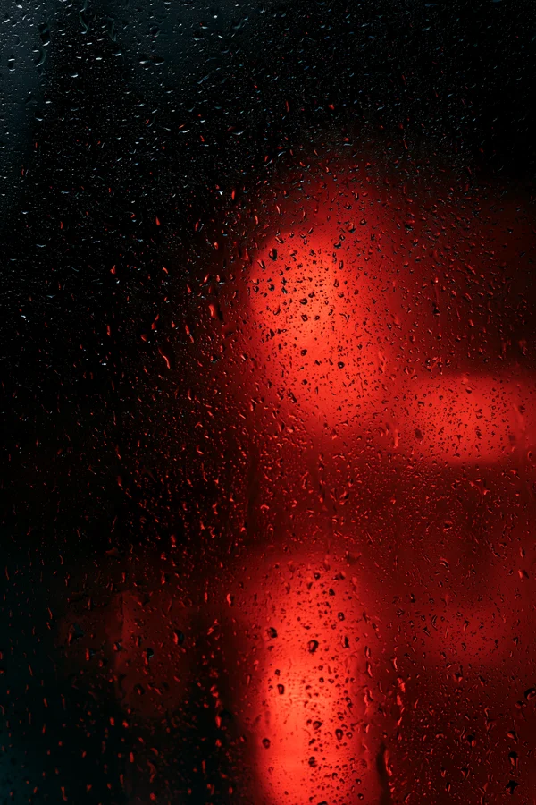 Raindrops on Dark Glass