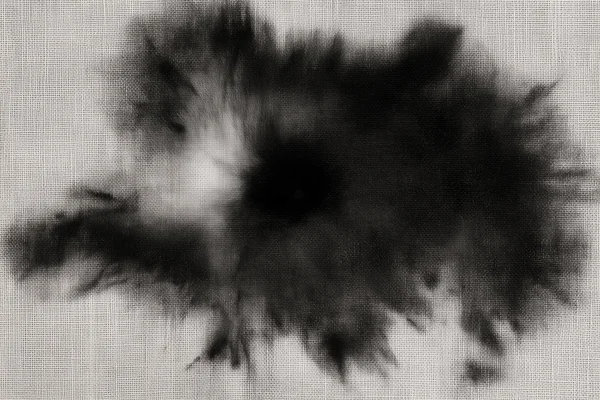 Black Ink Stain on Woven Fabric