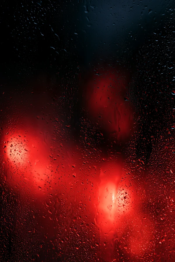 Raindrops on Dark Glass