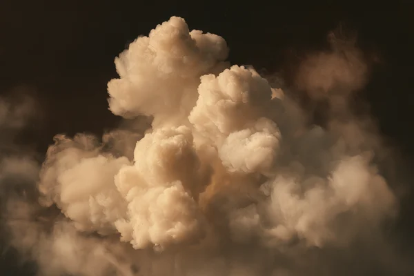 Creamy Smoke Plumes on Dark Background