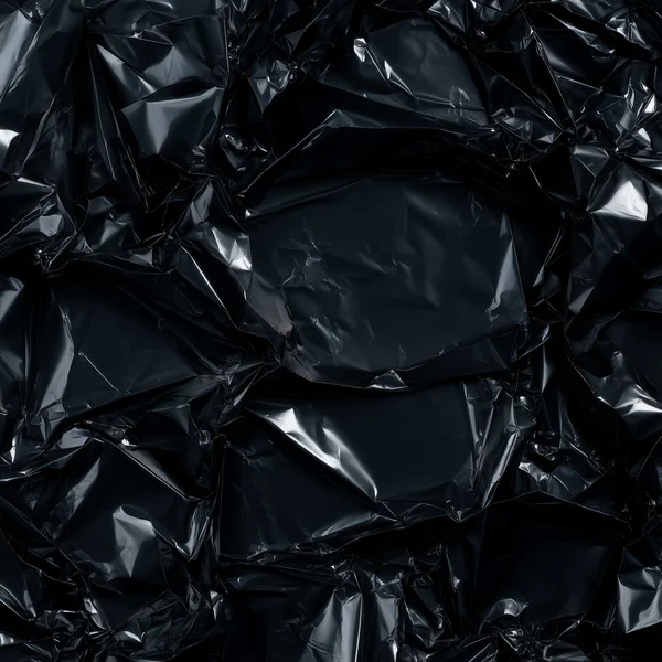 Crumpled Black Metallic Surface