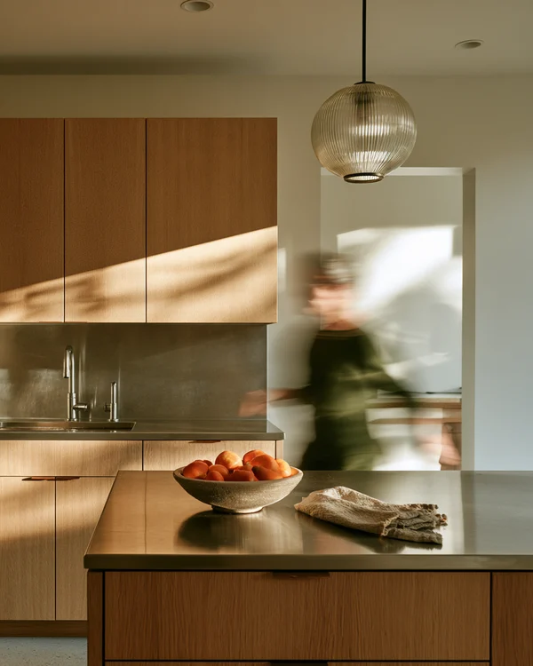 Modern Kitchen with Oak Cabinets and Fruit Bowl