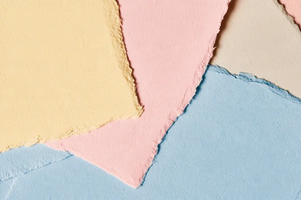 Layered Pastel Paper Sheets