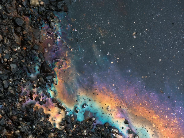 Iridescent Oil Sheen on Wet Asphalt