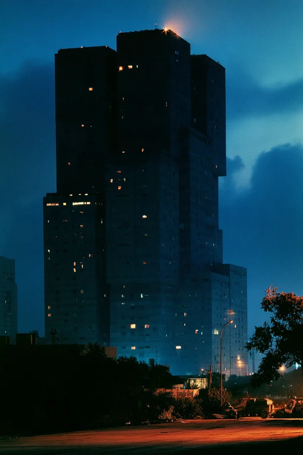 Towering Brutalist Skyscraper at Twilight