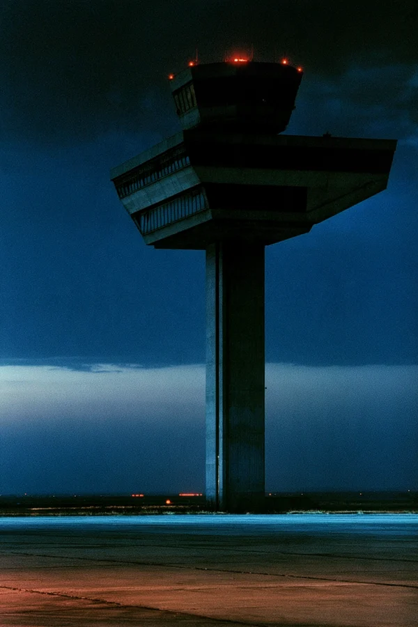Brutalist Airport Control Tower at Twilight