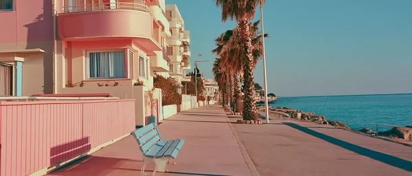 A Quiet Seaside Promenade at Sunset