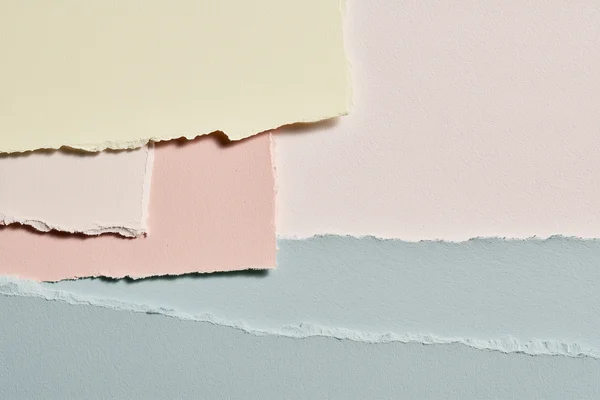 Layered Pastel Paper Sheets